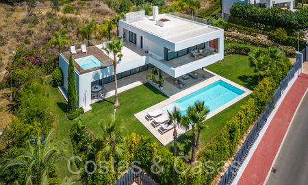 Superior luxury villa with modern architecture for sale a stone's throw from Nueva Andalucia's golf valley, Marbella 64175