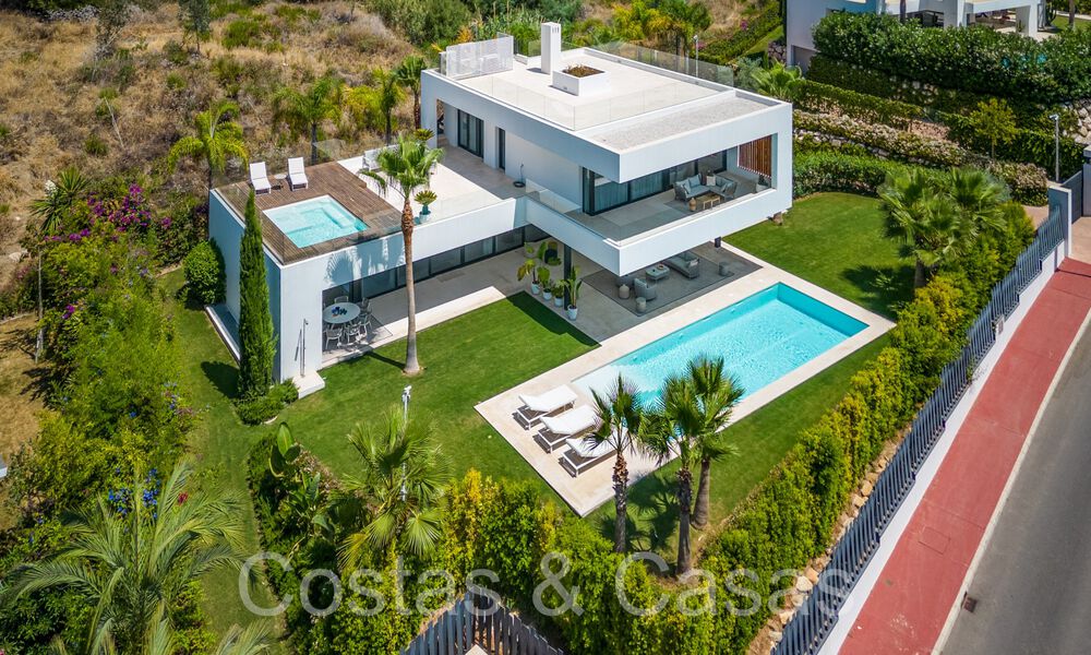 Superior luxury villa with modern architecture for sale a stone's throw from Nueva Andalucia's golf valley, Marbella 64175