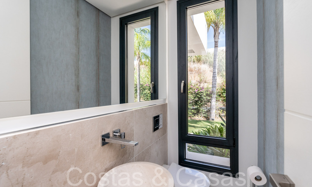 Superior luxury villa with modern architecture for sale a stone's throw from Nueva Andalucia's golf valley, Marbella 64179