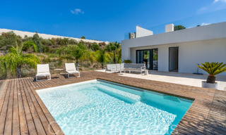Superior luxury villa with modern architecture for sale a stone's throw from Nueva Andalucia's golf valley, Marbella 64181 