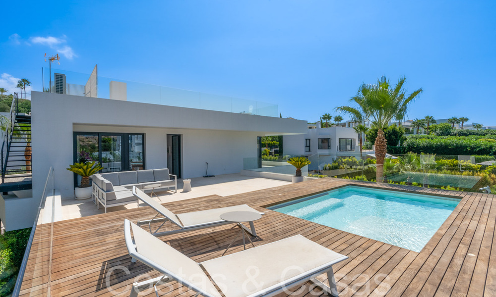 Superior luxury villa with modern architecture for sale a stone's throw from Nueva Andalucia's golf valley, Marbella 64185