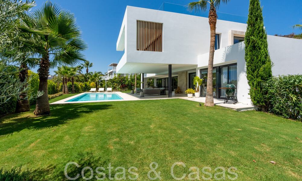 Superior luxury villa with modern architecture for sale a stone's throw from Nueva Andalucia's golf valley, Marbella 64199