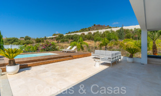 Superior luxury villa with modern architecture for sale a stone's throw from Nueva Andalucia's golf valley, Marbella 64200 