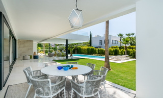 Superior luxury villa with modern architecture for sale a stone's throw from Nueva Andalucia's golf valley, Marbella 64202 