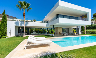 Superior luxury villa with modern architecture for sale a stone's throw from Nueva Andalucia's golf valley, Marbella 64209 