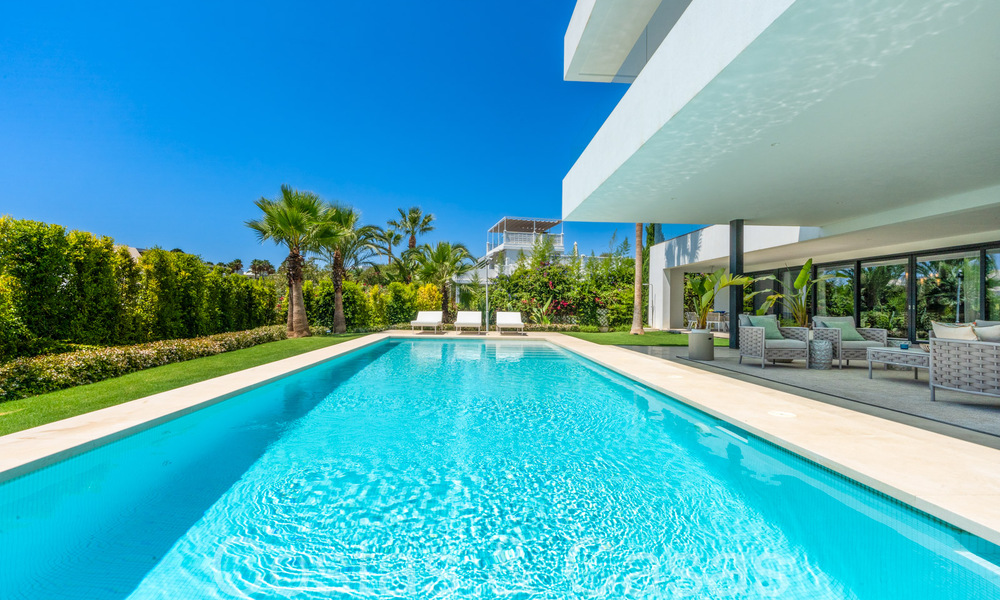 Superior luxury villa with modern architecture for sale a stone's throw from Nueva Andalucia's golf valley, Marbella 64217