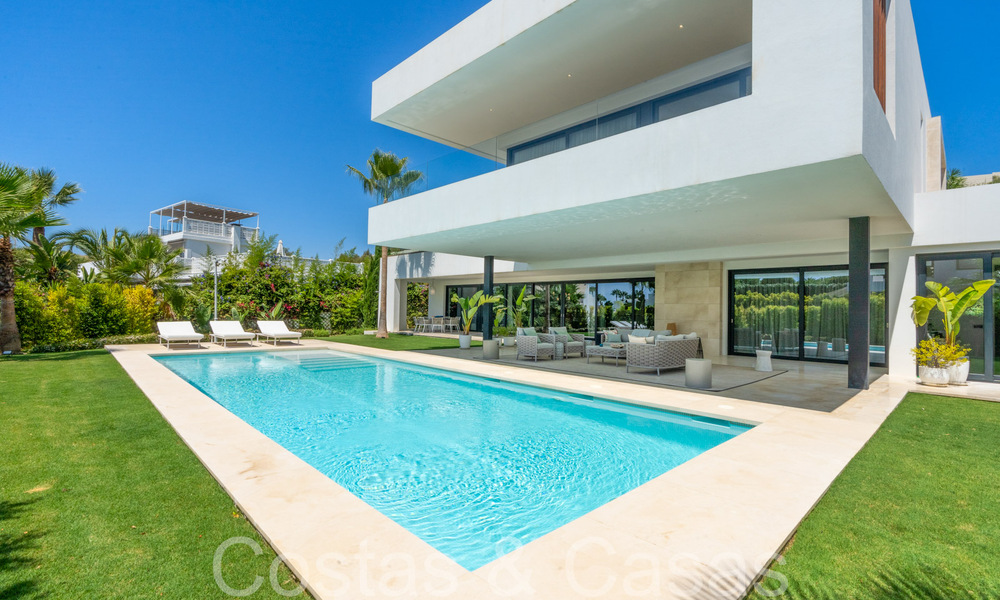 Superior luxury villa with modern architecture for sale a stone's throw from Nueva Andalucia's golf valley, Marbella 64229