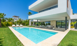 Superior luxury villa with modern architecture for sale a stone's throw from Nueva Andalucia's golf valley, Marbella 64229 
