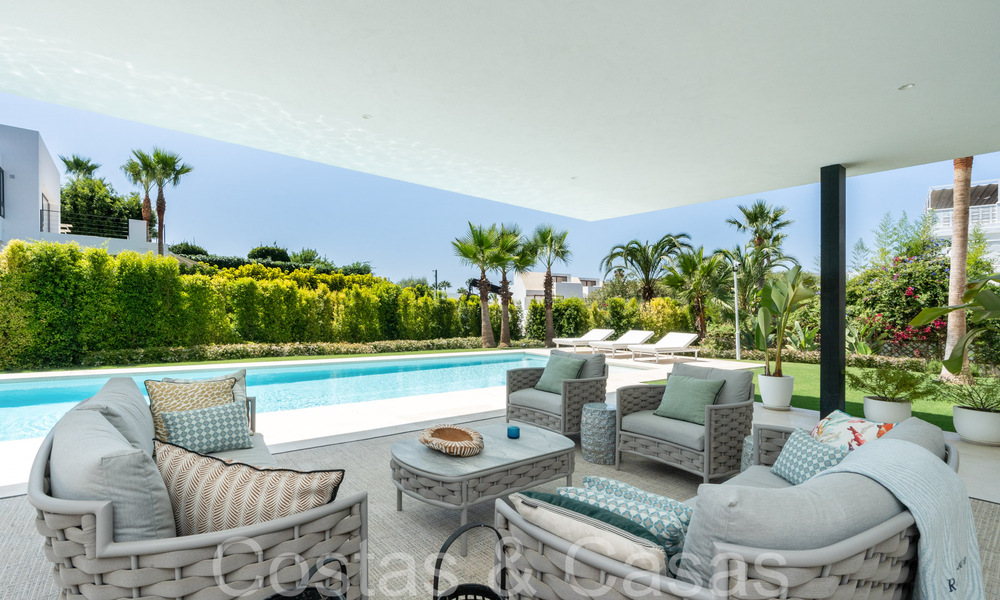 Superior luxury villa with modern architecture for sale a stone's throw from Nueva Andalucia's golf valley, Marbella 64233