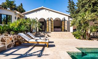 Mediterranean luxury villa with separate guesthouse for sale in Nueva Andalucia, Marbella 64432 