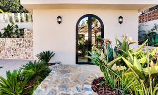 Mediterranean luxury villa with separate guesthouse for sale in Nueva Andalucia, Marbella 64437 