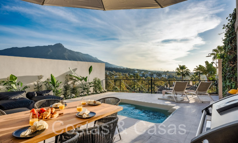 Sophisticated luxury apartment with lake, mountain and sea views for sale in Nueva Andalucia, Marbella 64466