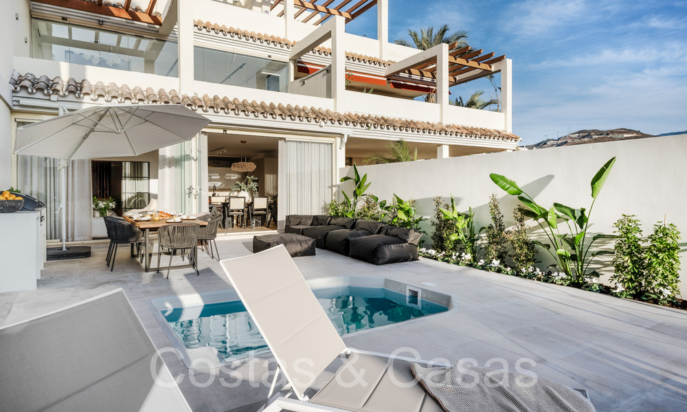 Sophisticated luxury apartment with lake, mountain and sea views for sale in Nueva Andalucia, Marbella 64467
