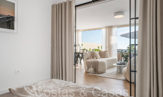 Sophisticated luxury apartment with lake, mountain and sea views for sale in Nueva Andalucia, Marbella 64489 