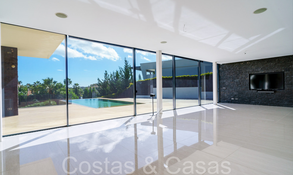 New luxury villa with advanced architectural style for sale in Nueva Andalucia's golf valley, Marbella 64580