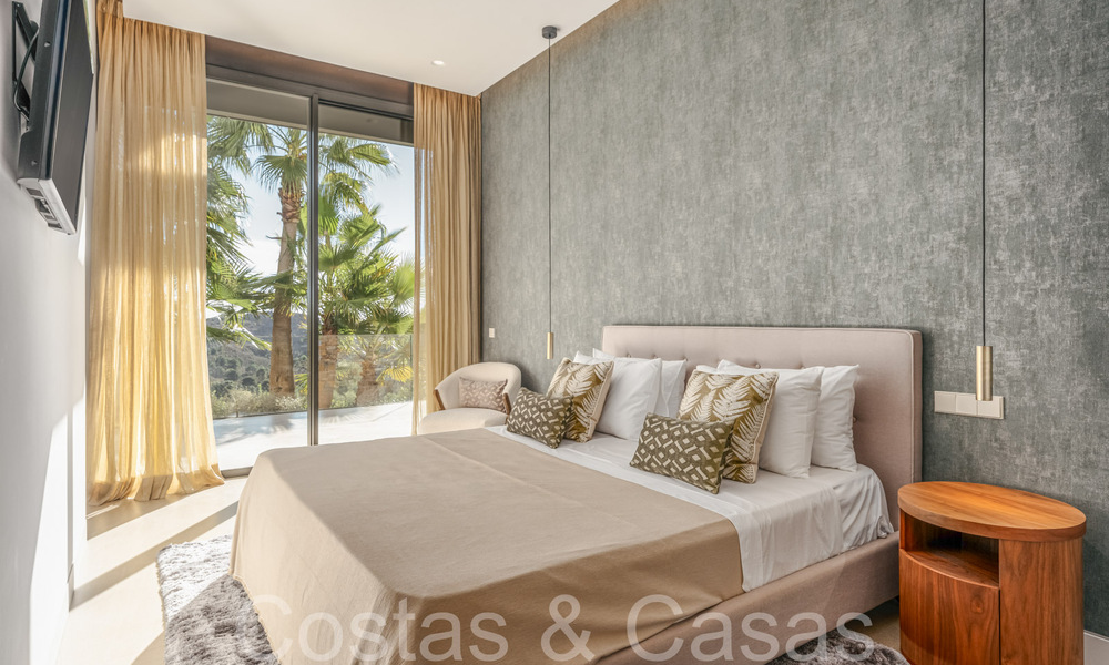 Ready to move in, modern luxury villa for sale, frontline golf in the prestigious Marbella Club Golf Resort in Benahavis 65370