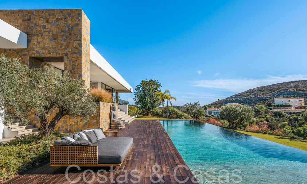 Ready to move in, modern luxury villa for sale, frontline golf in the prestigious Marbella Club Golf Resort in Benahavis 65373