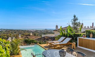 Luxurious apartment for sale with inviting terrace, private pool and sea views in Nueva Andalucia, Marbella 65182 