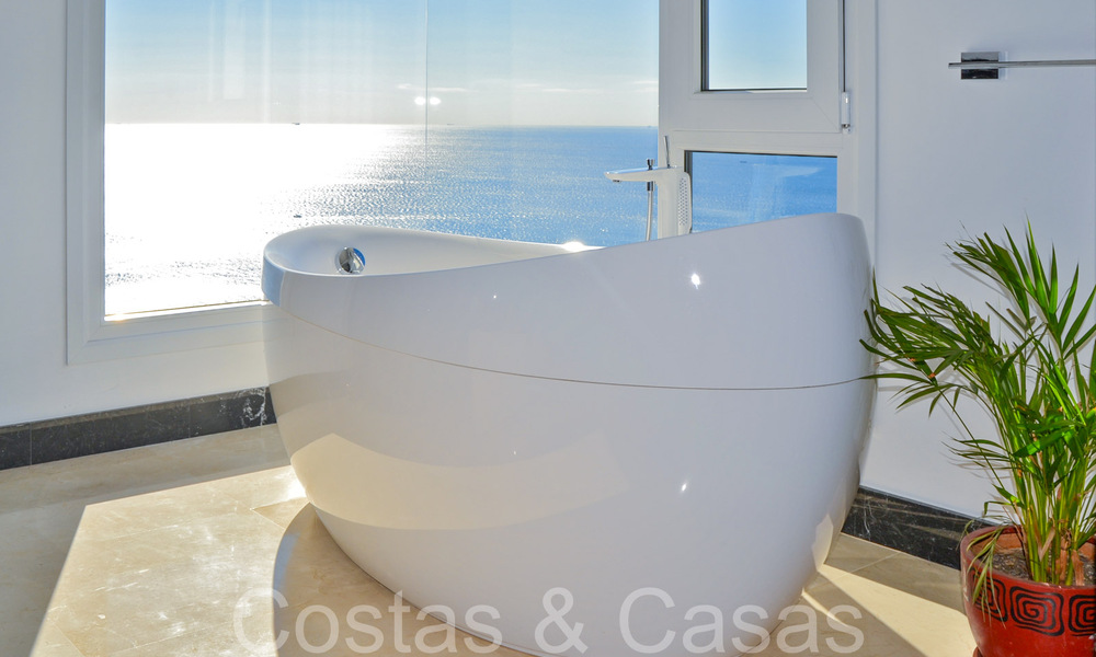 Luxurious villa with modern architectural style and breathtaking sea views for sale in Manilva, Costa del Sol 64980