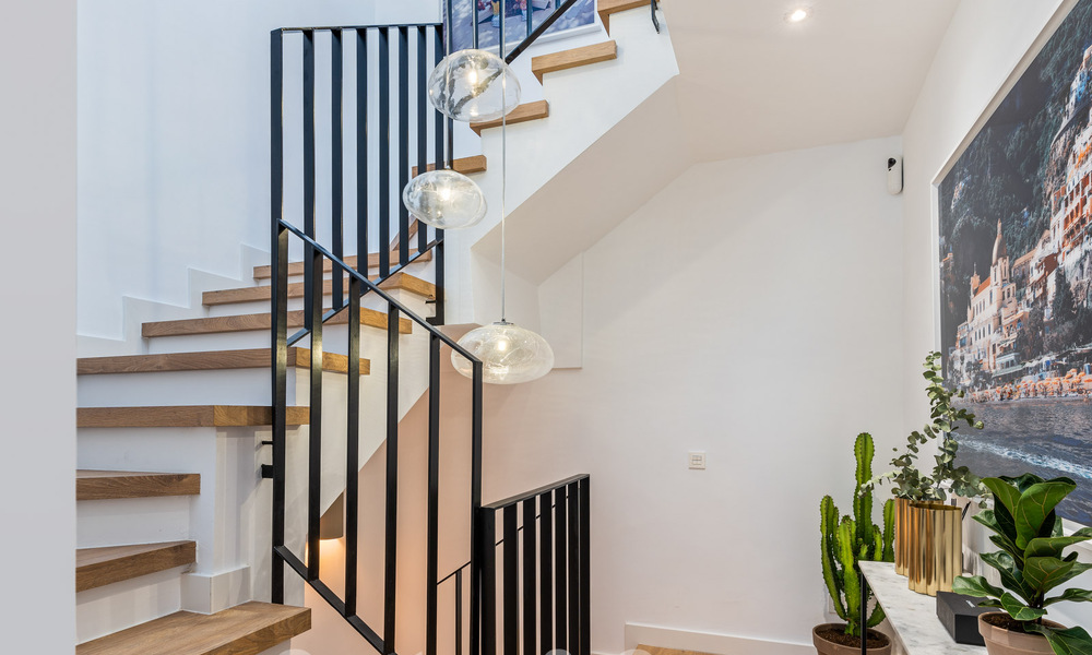 Luxuriously renovated terraced house for sale with spacious terrace and views of the golf course in La Quinta golf resort, Benahavis - Marbella 64648