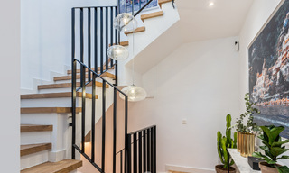 Luxuriously renovated terraced house for sale with spacious terrace and views of the golf course in La Quinta golf resort, Benahavis - Marbella 64648 