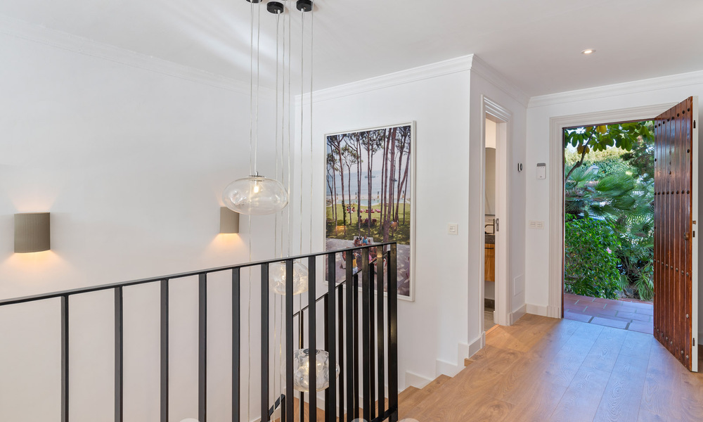 Luxuriously renovated terraced house for sale with spacious terrace and views of the golf course in La Quinta golf resort, Benahavis - Marbella 64651