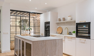 Luxuriously renovated terraced house for sale with spacious terrace and views of the golf course in La Quinta golf resort, Benahavis - Marbella 64660 