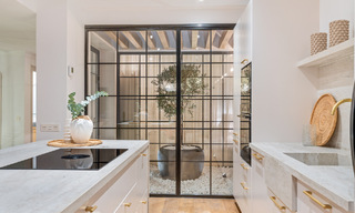 Luxuriously renovated terraced house for sale with spacious terrace and views of the golf course in La Quinta golf resort, Benahavis - Marbella 64661 