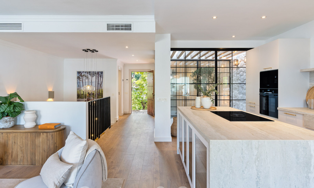 Luxuriously renovated terraced house for sale with spacious terrace and views of the golf course in La Quinta golf resort, Benahavis - Marbella 64667