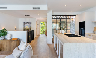 Luxuriously renovated terraced house for sale with spacious terrace and views of the golf course in La Quinta golf resort, Benahavis - Marbella 64667 