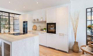 Luxuriously renovated terraced house for sale with spacious terrace and views of the golf course in La Quinta golf resort, Benahavis - Marbella 64668 