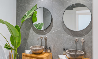 Luxuriously renovated terraced house for sale with spacious terrace and views of the golf course in La Quinta golf resort, Benahavis - Marbella 64674 