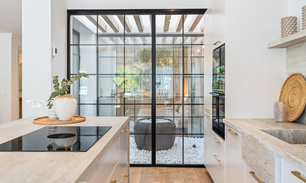 Luxuriously renovated terraced house for sale with spacious terrace and views of the golf course in La Quinta golf resort, Benahavis - Marbella 64682