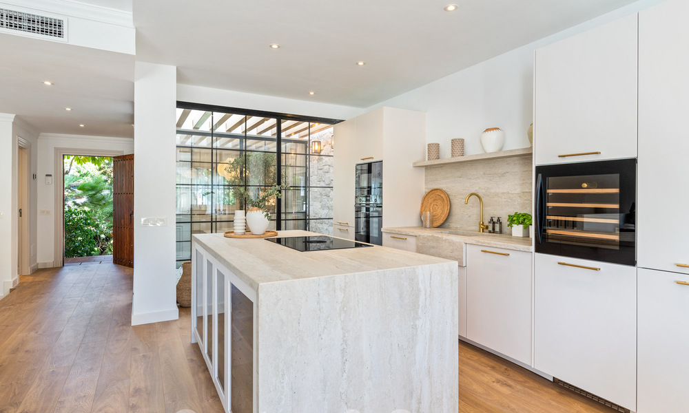 Luxuriously renovated terraced house for sale with spacious terrace and views of the golf course in La Quinta golf resort, Benahavis - Marbella 64683