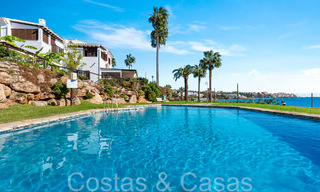 Trendy beach house for sale with stunning sea views in a first line beach complex close to Estepona town 65382 