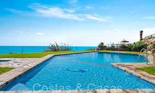 Trendy beach house for sale with stunning sea views in a first line beach complex close to Estepona town 65384 
