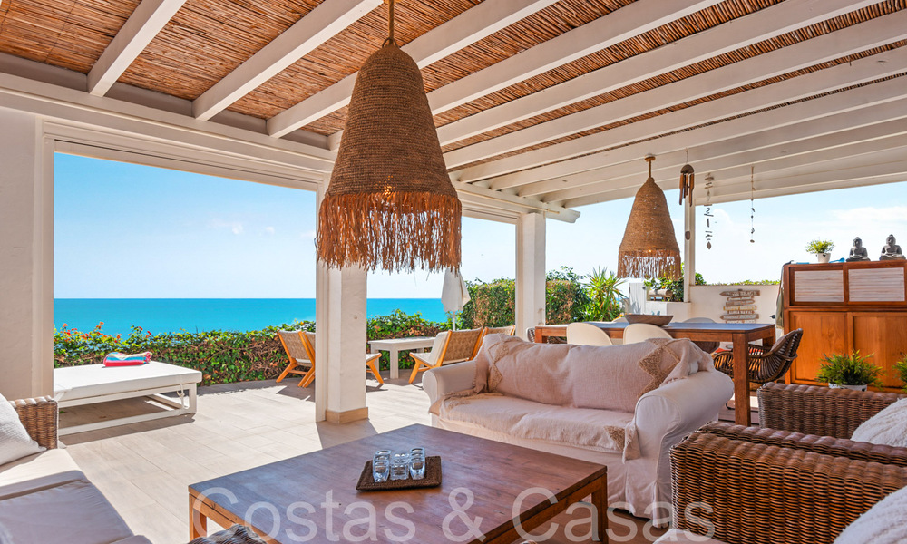 Trendy beach house for sale with stunning sea views in a first line beach complex close to Estepona town 65387