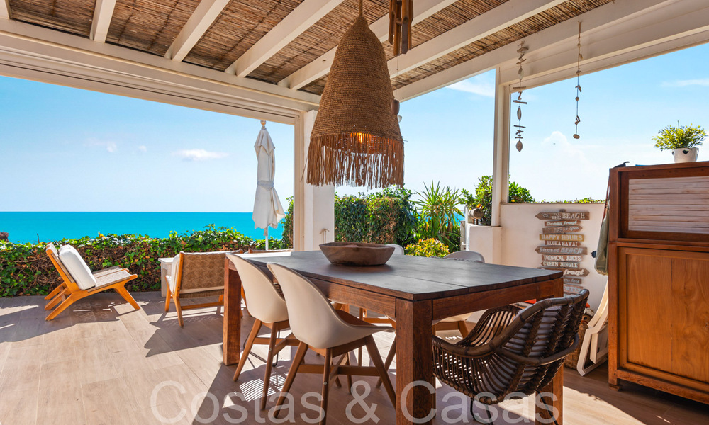 Trendy beach house for sale with stunning sea views in a first line beach complex close to Estepona town 65388