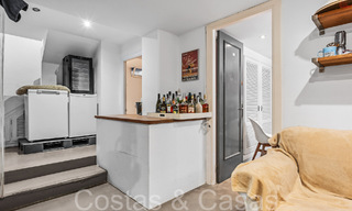 Trendy beach house for sale with stunning sea views in a first line beach complex close to Estepona town 65393 