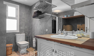 Trendy beach house for sale with stunning sea views in a first line beach complex close to Estepona town 65396 