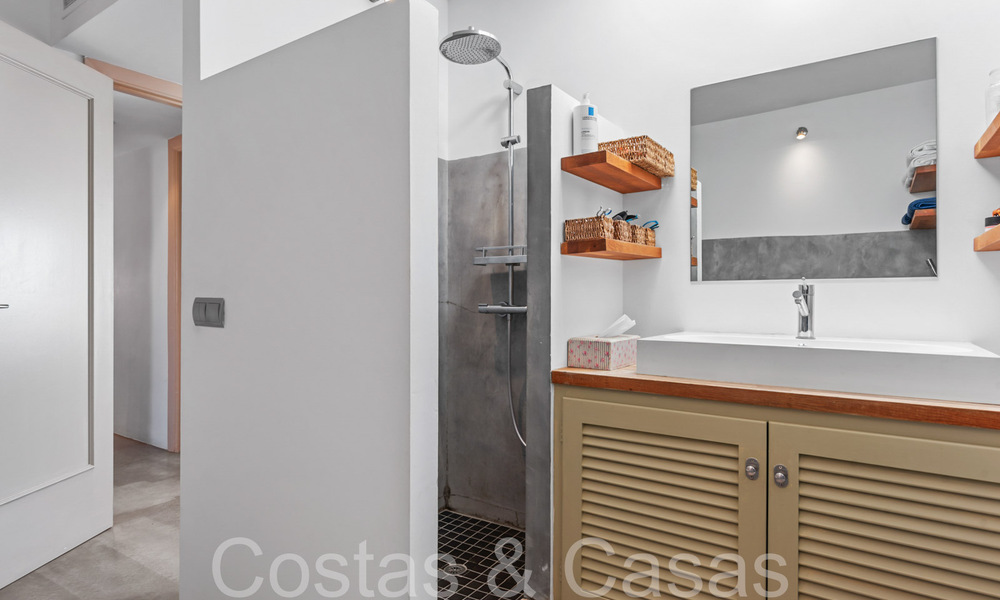 Trendy beach house for sale with stunning sea views in a first line beach complex close to Estepona town 65400