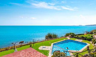 Trendy beach house for sale with stunning sea views in a first line beach complex close to Estepona town 65401 