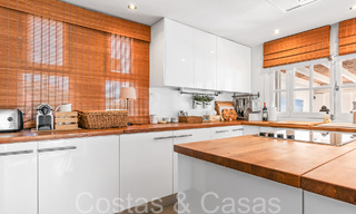 Trendy beach house for sale with stunning sea views in a first line beach complex close to Estepona town 65406 