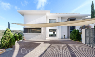 Modernist luxury villa for sale in a gated urbanization in La Quinta, Marbella - Benahavis 65698 