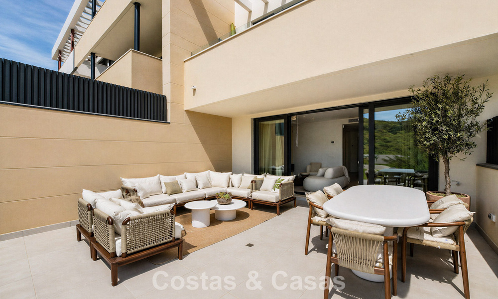 New build apartments with avant-garde design for sale, front line golf in Casares, Costa del Sol 799022