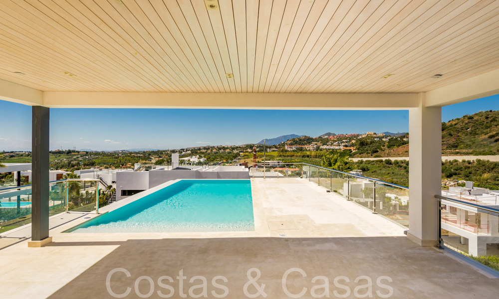 New villa with modern architectural style for sale in Nueva Andalucia's golf valley, Marbella 65911