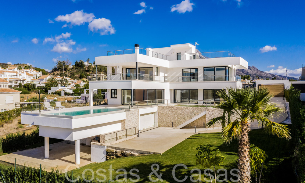 New villa with modern architectural style for sale in Nueva Andalucia's golf valley, Marbella 65931