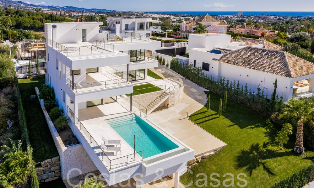New villa with modern architectural style for sale in Nueva Andalucia's golf valley, Marbella 65933