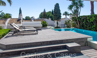 Timeless Andalusian luxury villa for sale in a gated area near Aloha Golf in Nueva Andalucia, Marbella 66561 