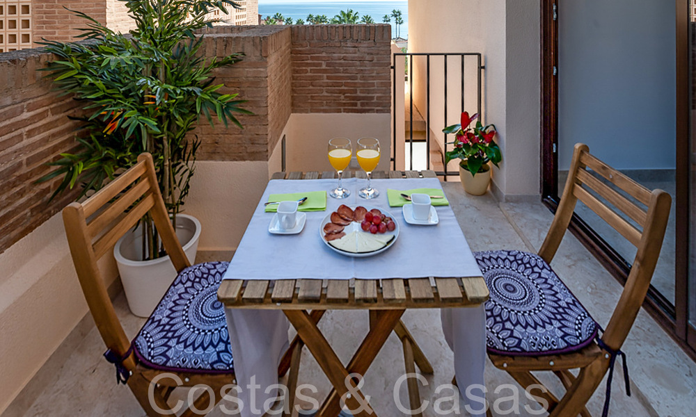 Contemporary duplex penthouse for sale in a first line beach complex with private pool between Marbella and Estepona 66577